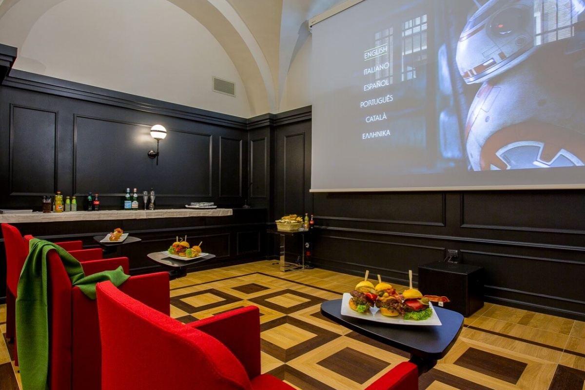 47 Boutique Hotel - A small cinema inside the hotel with a large screen.