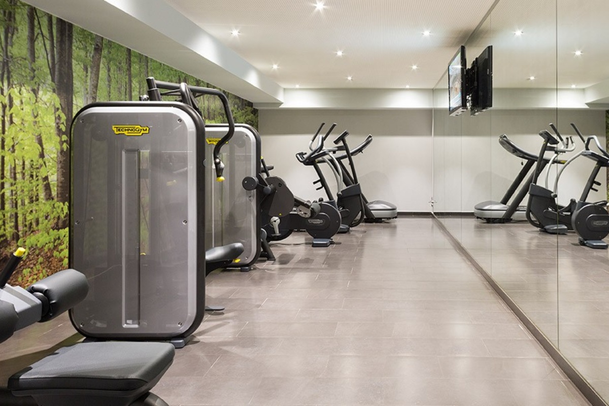 Andante Hotel - a gym with exercise machines