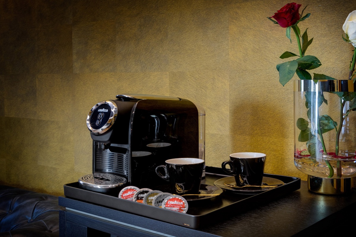 Dharma Boutique Hotel & Spa - A Lavazza pod coffee machine in the hotel room.