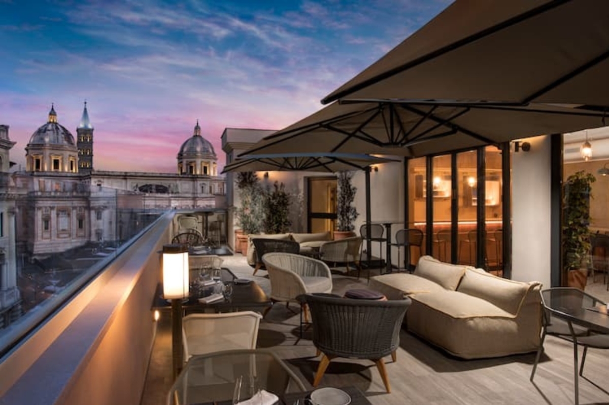 Doubletree by Hilton Rome Monti - Rooftop bar with a view of Santa Maria Maggiore Church.