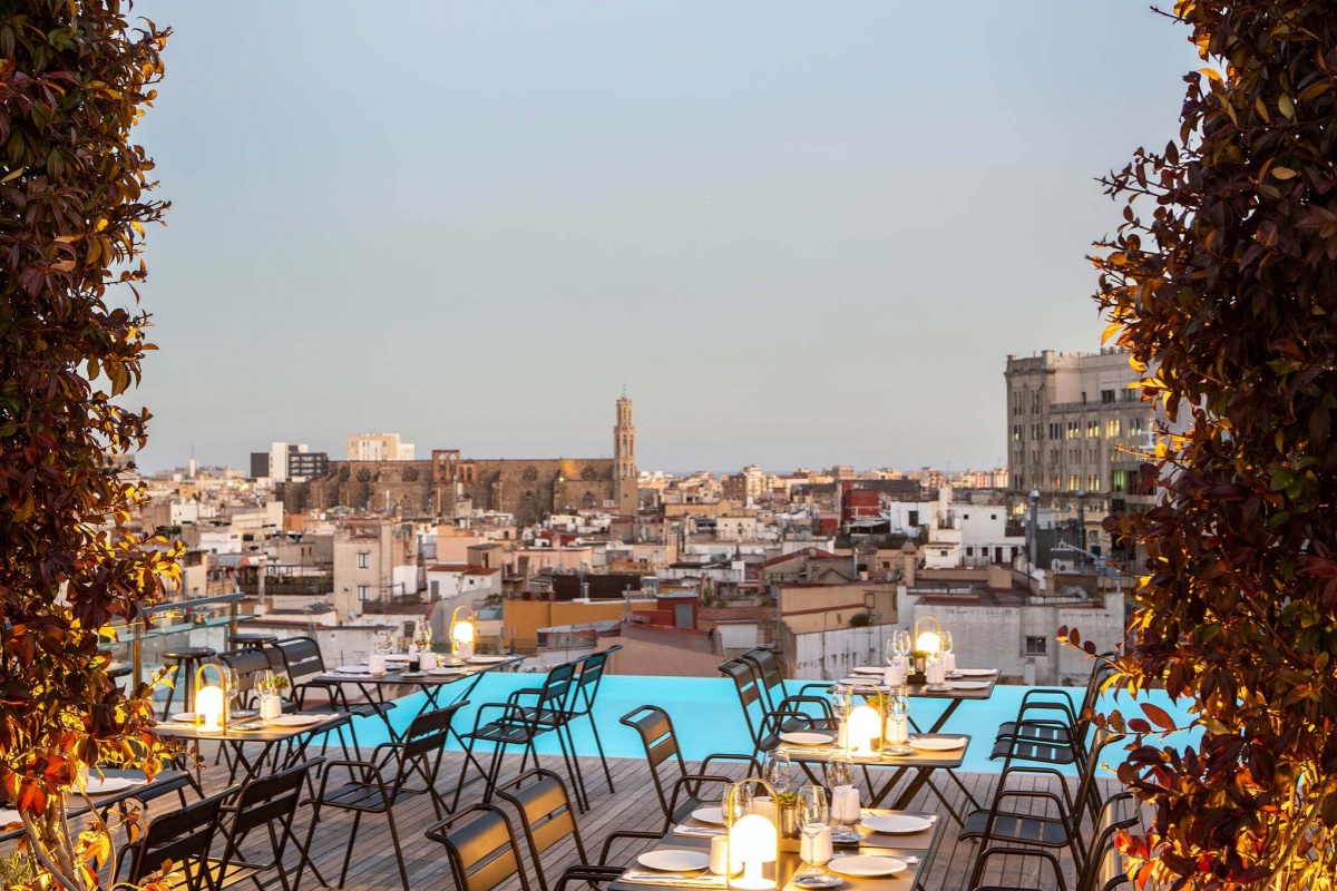 Grand Hotel Central - a rooftop restaurant with a view of a city