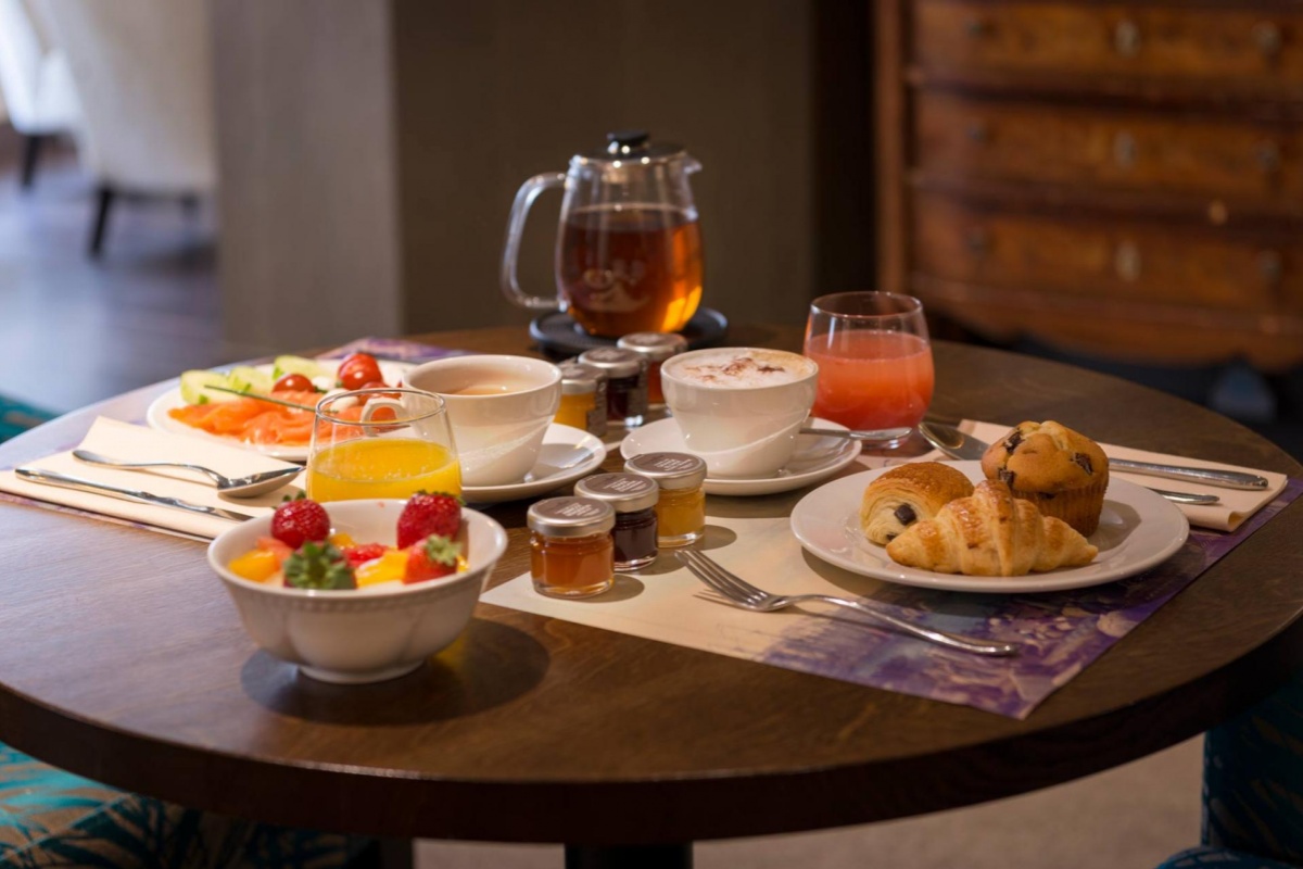 Hotel La Bourdonnais - a table with food on it