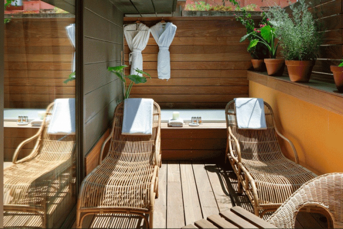 Hotel Neri Relais & Chateaux - a deck with chairs and towels