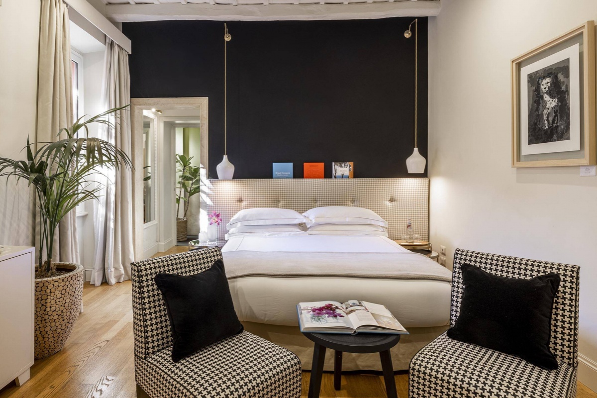 Nerva Boutique Hotel - A comfortable double bedroom with contemporary furnishings.