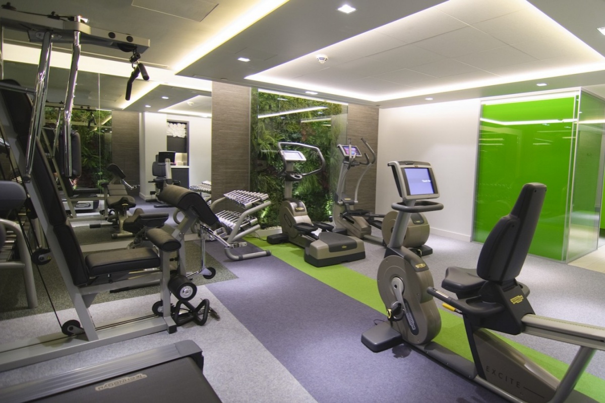 Sofitel London St James - a room with exercise equipment