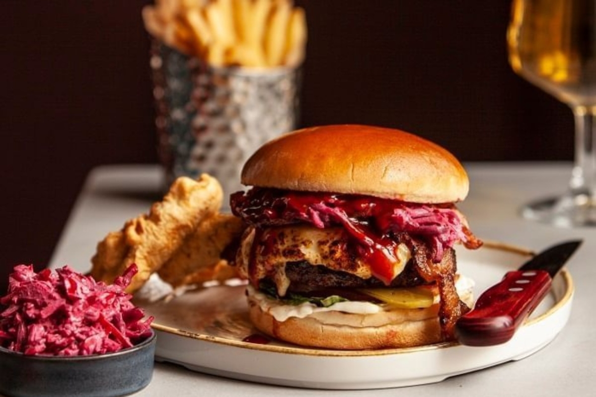 The Clermont, Charing Cross - a burger with a side of coleslaw and fries