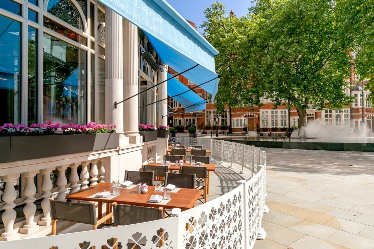 The Connaught - a restaurant with tables and chairs
