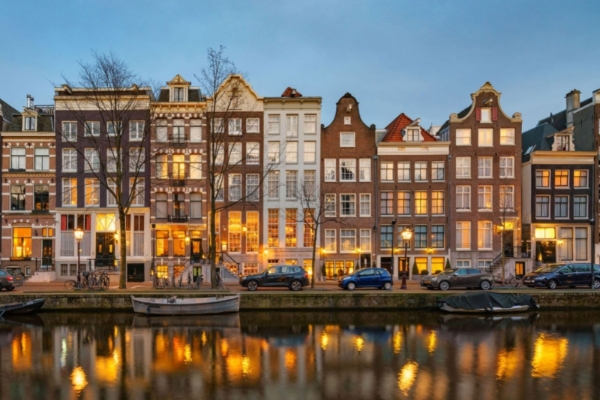 Ambassade Hotel - a row of buildings next to a canal