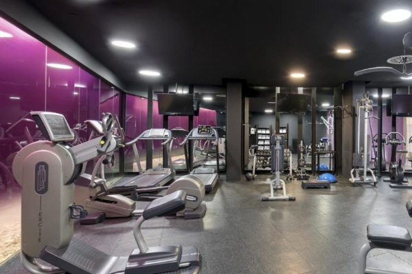 Barcelo Raval - a gym with exercise equipment