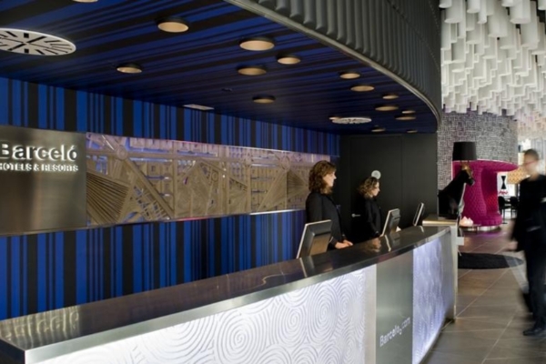 Barcelo Raval - people standing at a reception desk