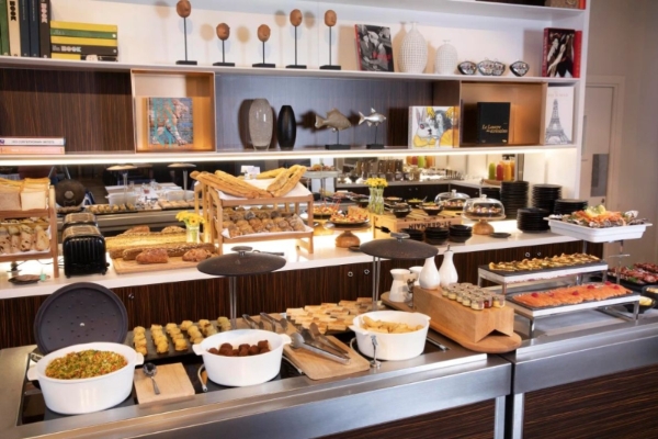 Bel Ami Hotel - a buffet with food on the counter