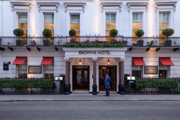 Brown's Hotel - a man standing in front of a hotel