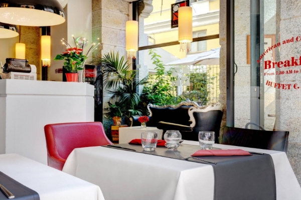 Dharma Luxury Hotel - Inside the restaurant with it's stylish black and red decor.