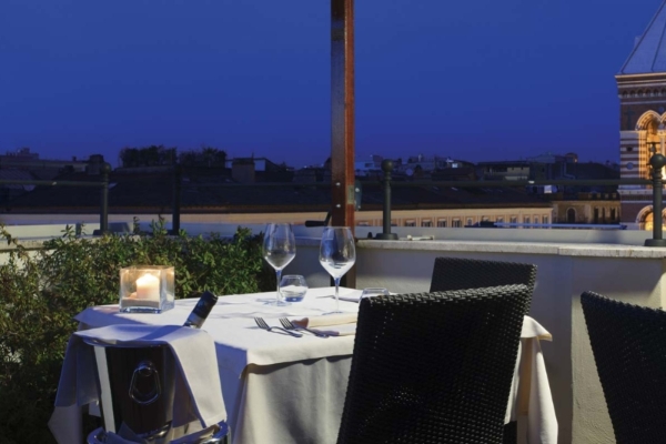 Hotel Artemide - Rooftop terrace restaurant overlooking the city of Rome.