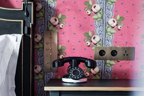 Hotel de JoBo - a black telephone on a table