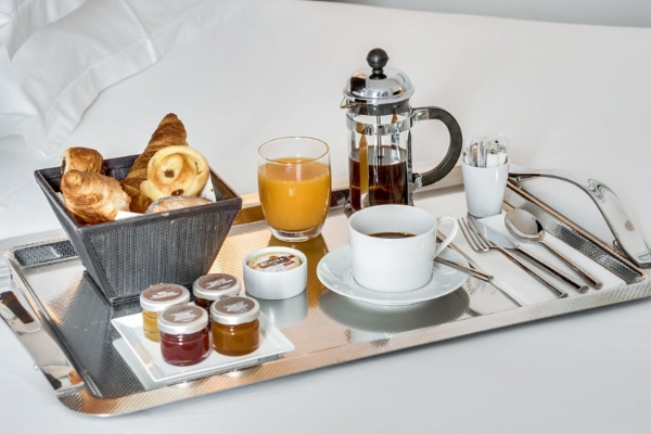 Hotel Le A - a tray of breakfast items