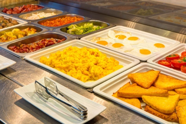 iQ Hotel Roma - Buffet breakfast with a selection of hot and cold choices.