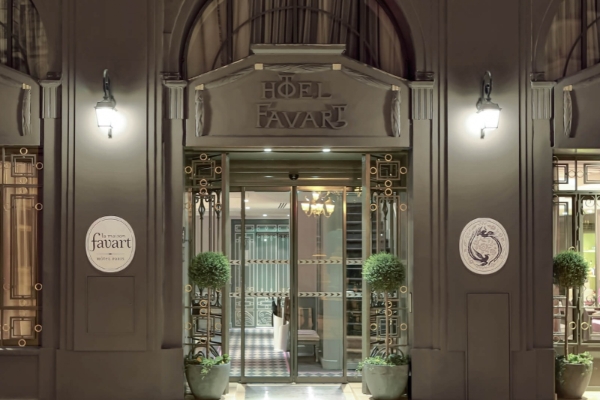 La Maison Favart - a building with a door and windows