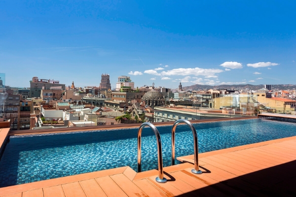 Negresco Princess Hotel - a pool with a view of a city