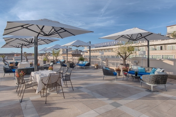 NH Collection Roma Palazzo Cinquecento - Rooftop terrace during the day, with view of Rome.