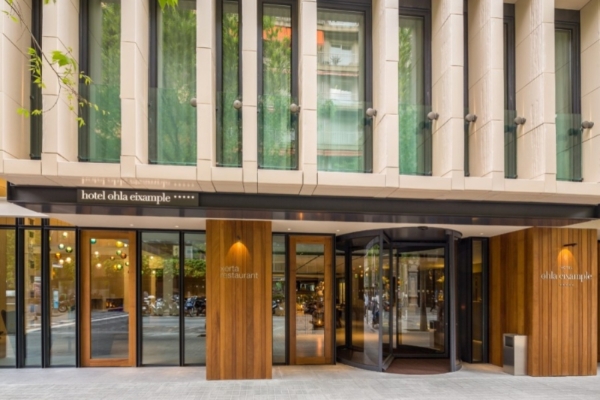 Ohla Eixample - a building with glass doors