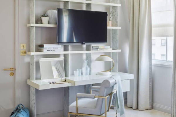 One Aldwych - a desk with a tv on the wall