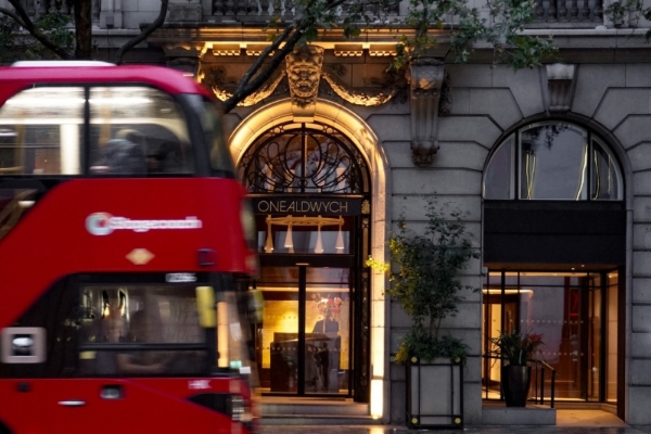 One Aldwych - a double decker bus in front of a building