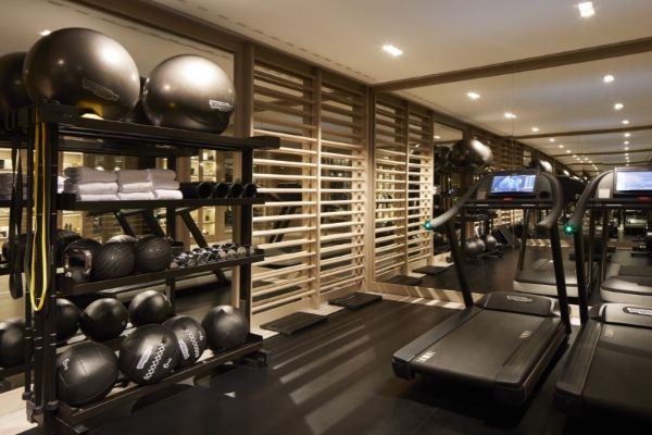 Seventy Barcelona - a room with treadmills and exercise equipment