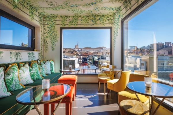 Singer Palace Hotel - Covered seating area on the rooftop terrace.