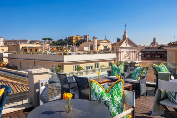 Singer Palace Hotel - Rooftop terrace during the day, with panoramic views of Rome.