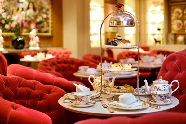 Sofitel London St James - a tea set with a cake and teapot