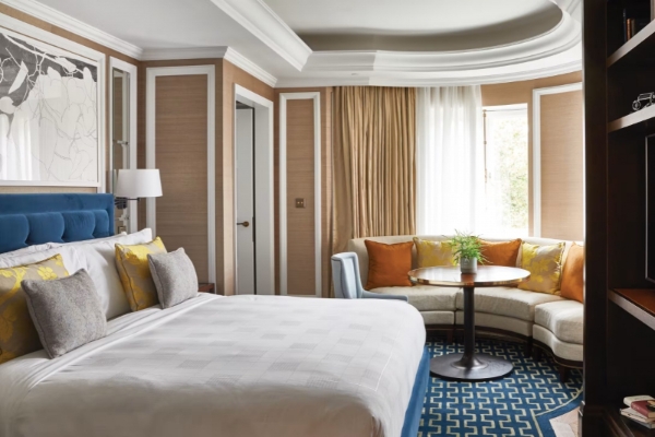 The Cadogan, A Belmond Hotel, London - a room with a bed and couches