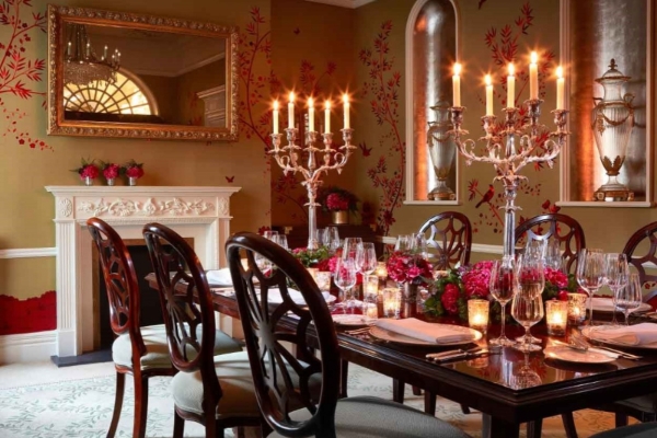 The Goring - a dining table with candles on it