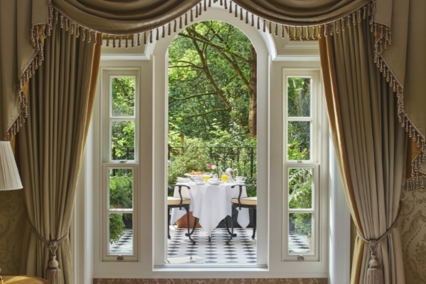 The Goring - a window with a table and chairs outside