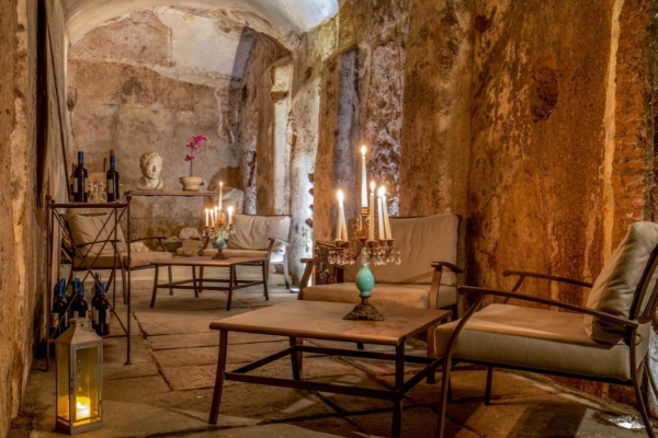 The Inn At The Roman Forum - Hotel lounge area in an ancient Roman portico.