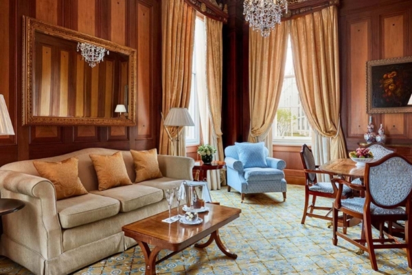 The Lanesborough - a living room with a couch and chairs