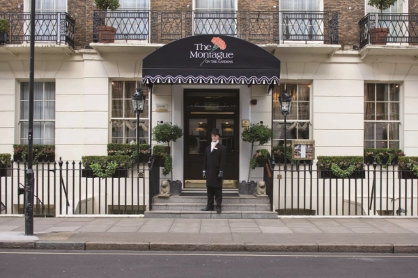 The Montague on The Gardens - a man standing in front of a building