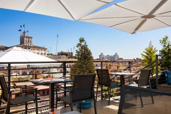 U-Visionary Roma Hotel - Rooftop terrace restaurant with panoramic views of Rome.